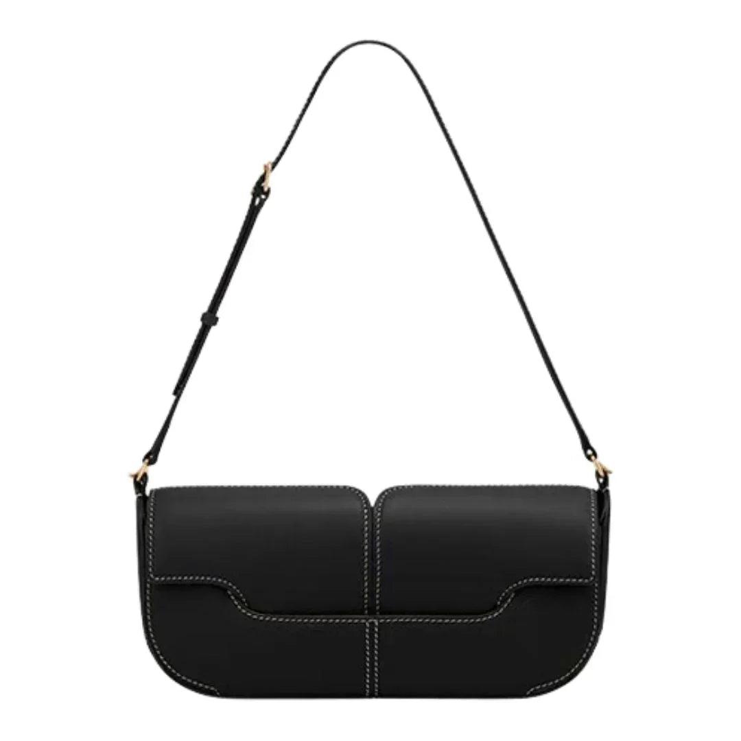 Black leather shoulder bag with white stitching and adjustable strap on white background