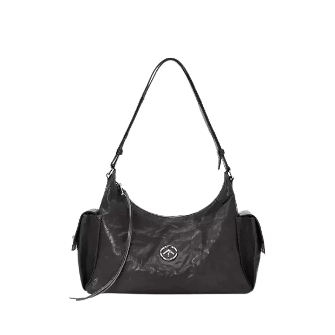 Black leather shoulder bag with logo, side pockets, and adjustable strap on white background