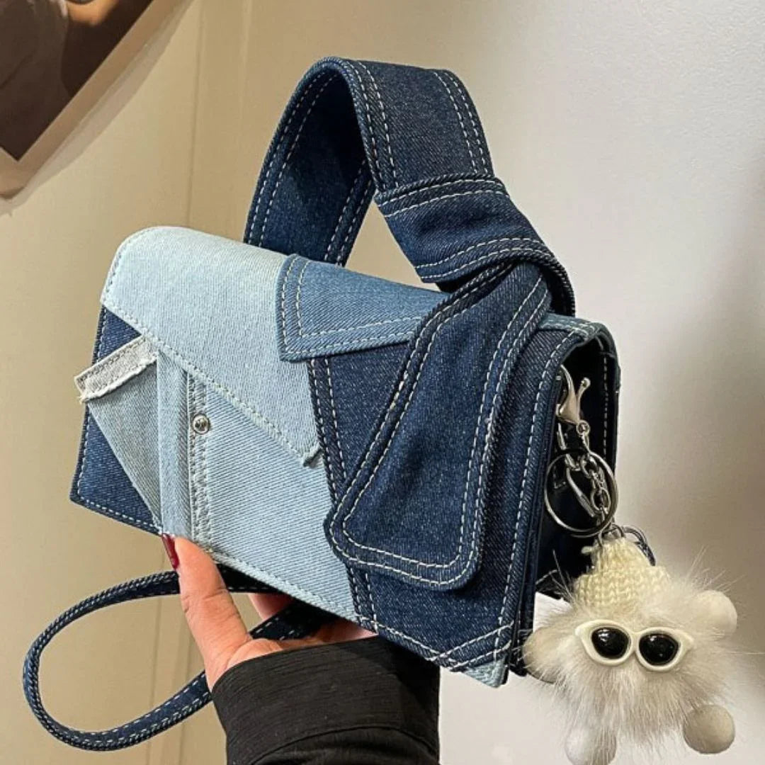 Denim patchwork handbag with fuzzy sunglasses keychain accessory