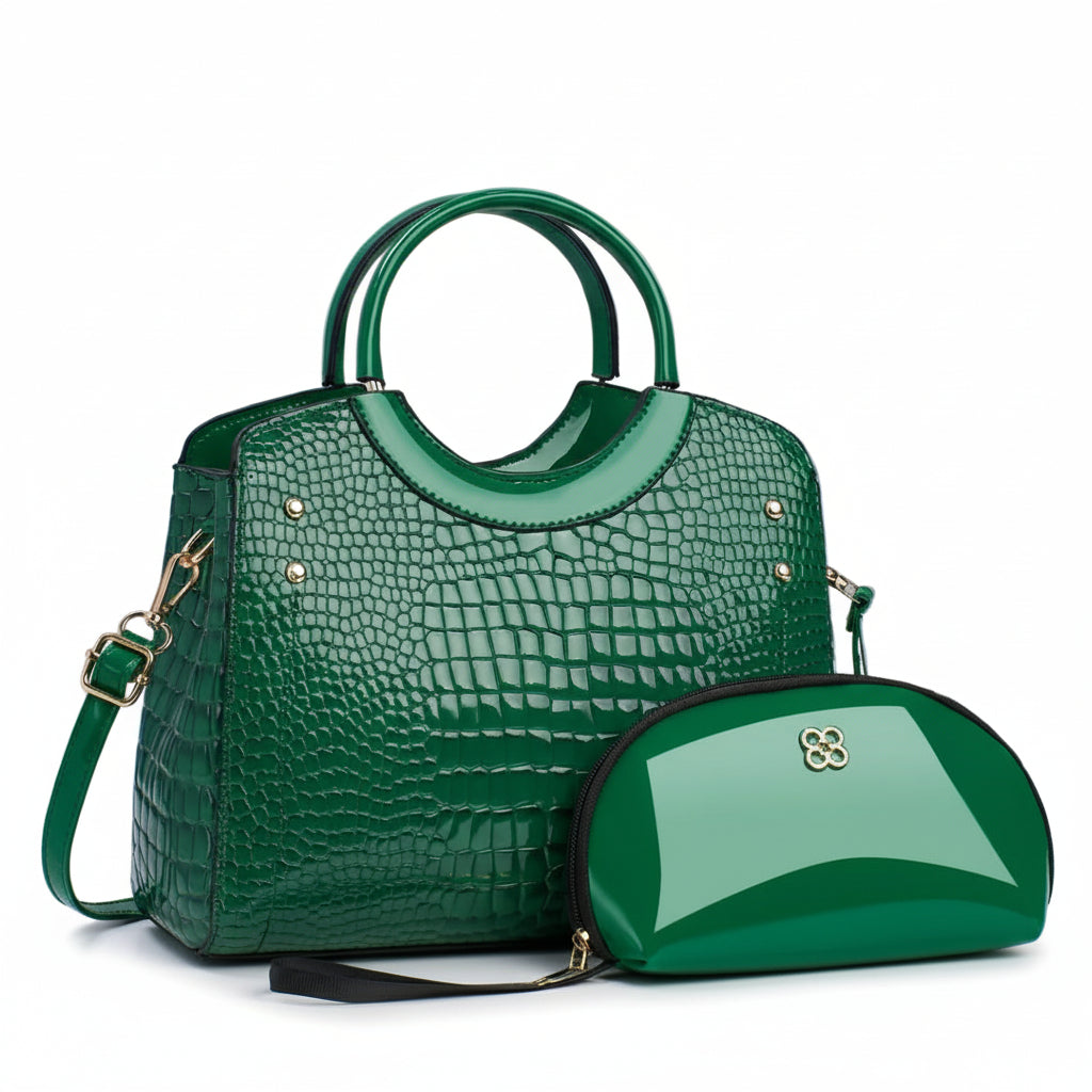 Shiny green crocodile pattern handbag with round handles and matching glossy makeup pouch