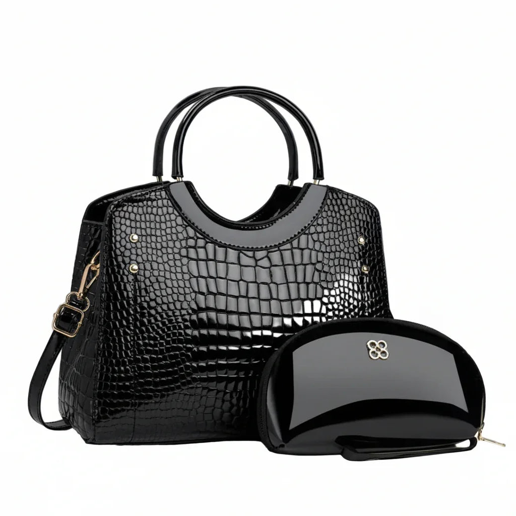 Black crocodile pattern handbag with matching glossy black makeup pouch, gold details