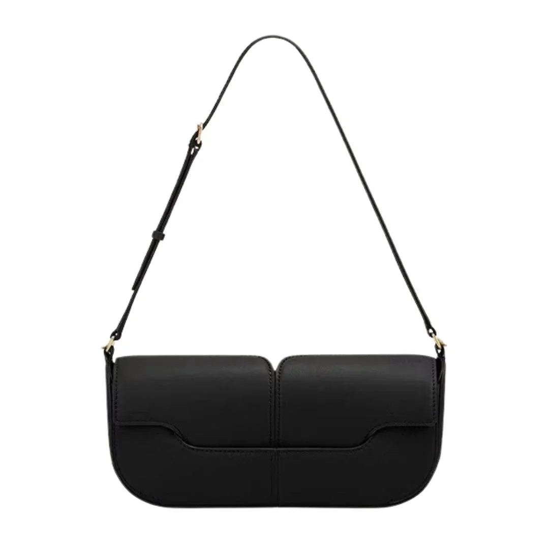Black leather shoulder bag with adjustable strap and minimalistic design on white background