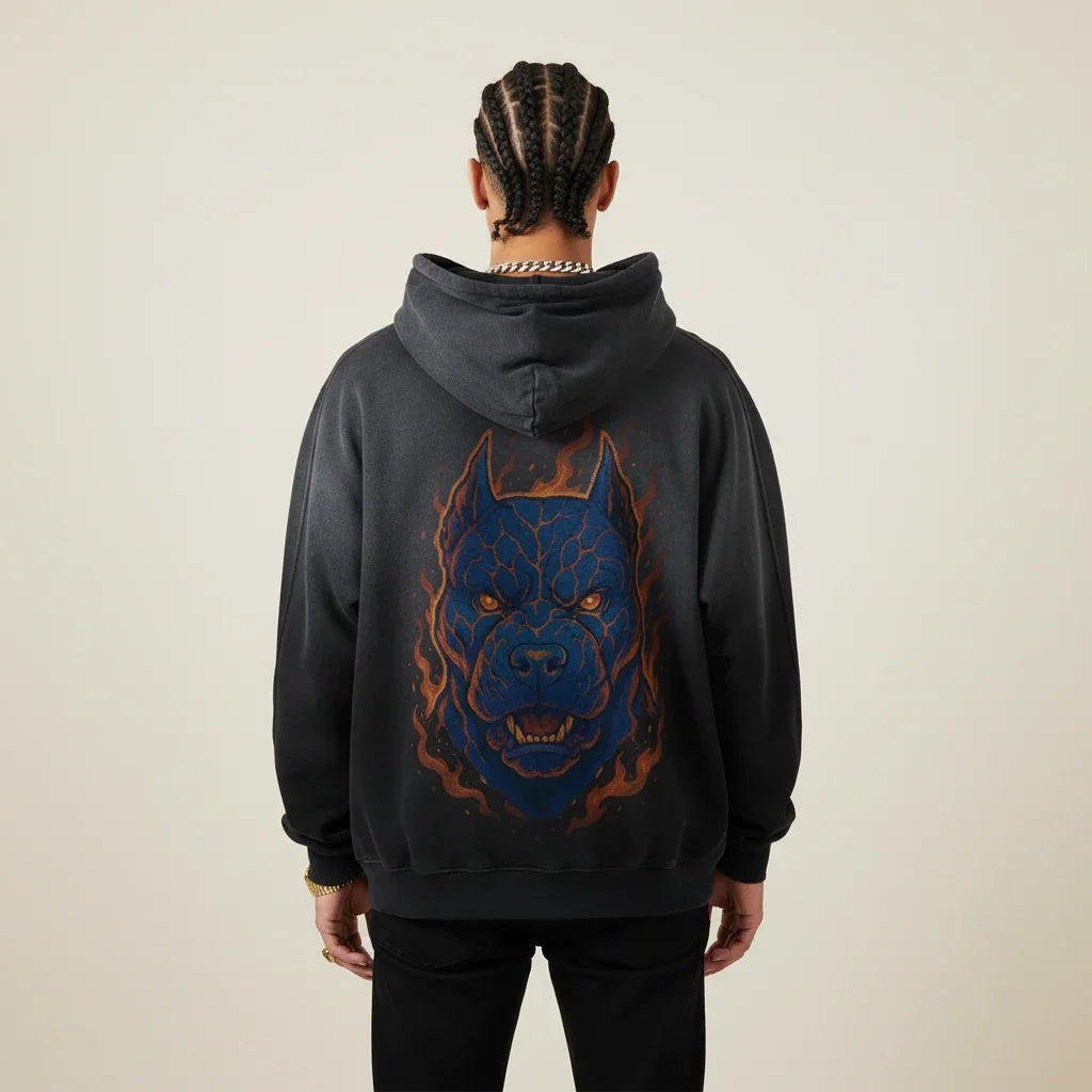 Black Pitbull hoodie with a blue and orange Pitbull graphic on the back against a plain background | Rebooters