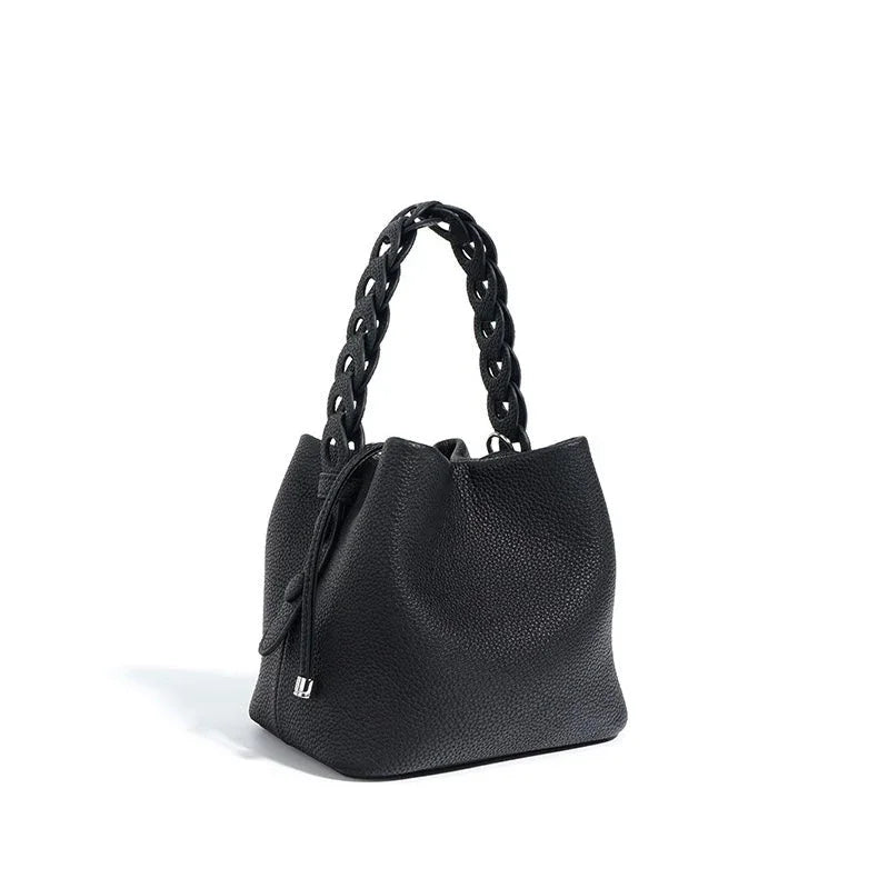Black leather bucket bag with chunky chain handle on white background