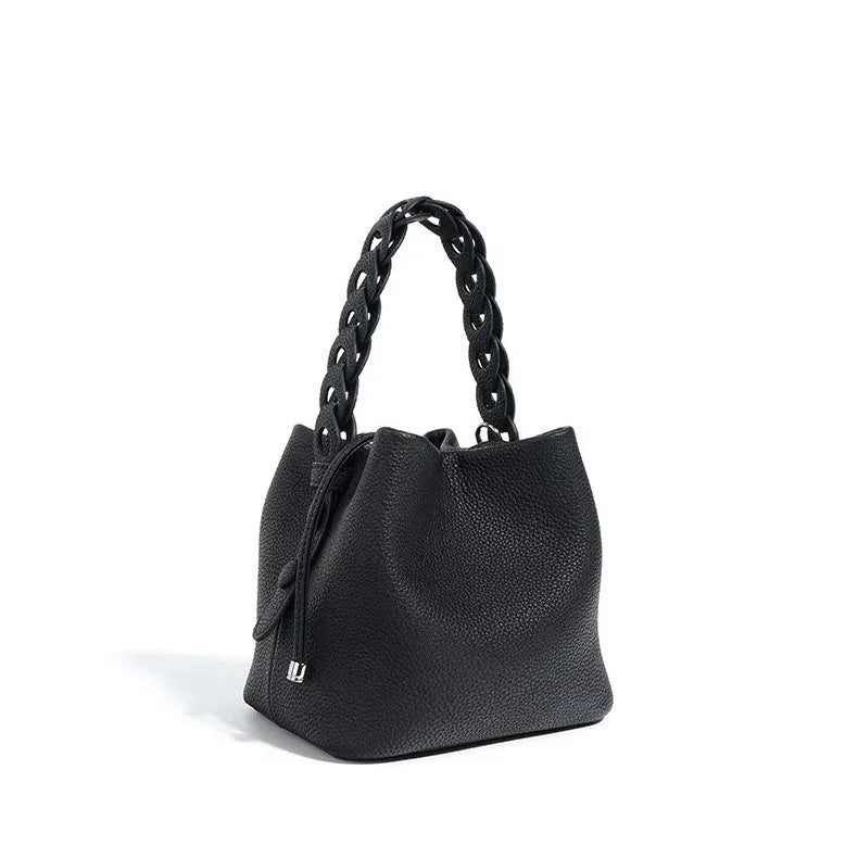 Black leather bucket bag with chunky chain handle on white background