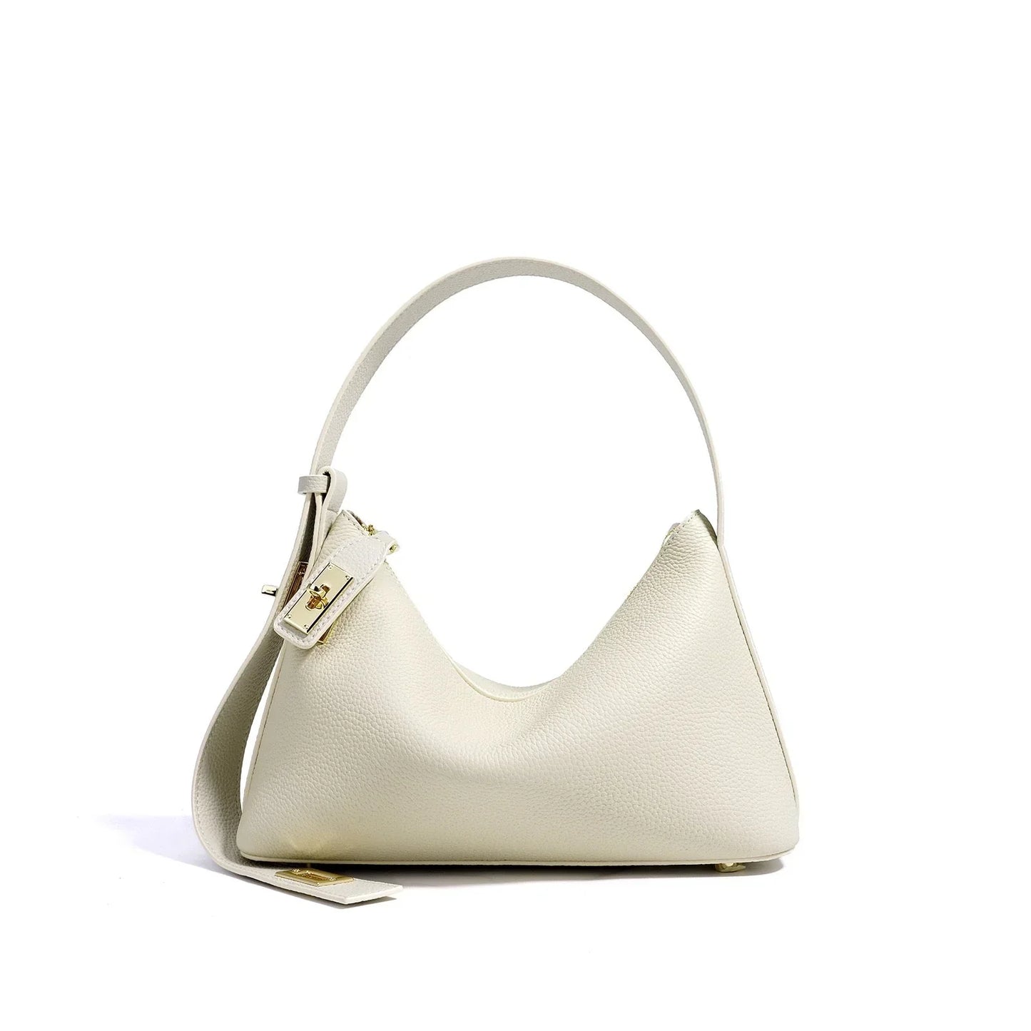 Ivory leather handbag with top handle and gold hardware on white background