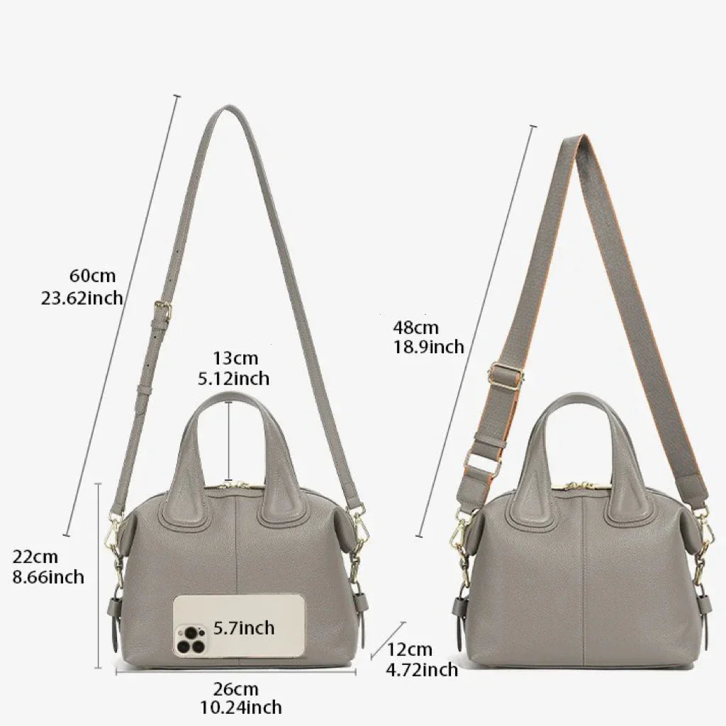 Gray leather handbag size guide with adjustable shoulder strap and labeled dimensions in cm and inches.