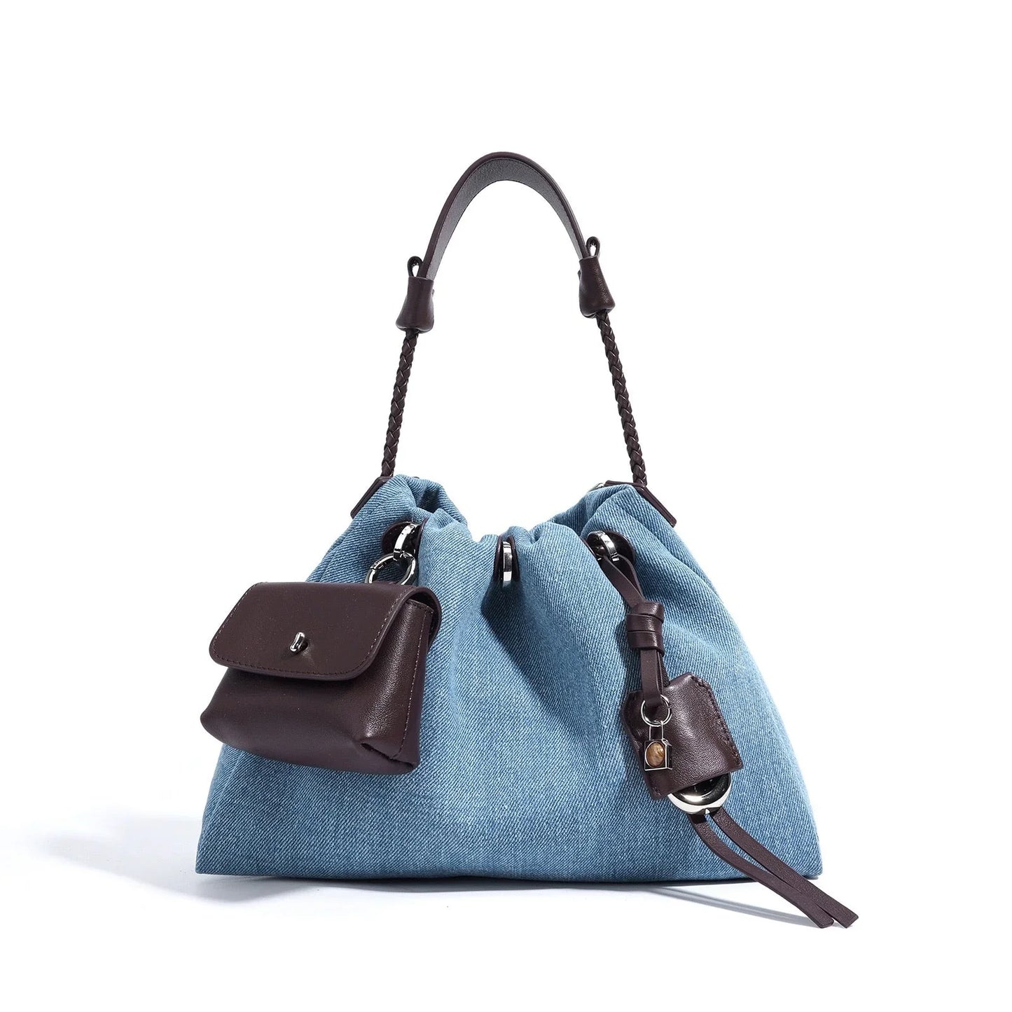 Blue denim hobo bag with brown leather handle and attached brown mini pouch