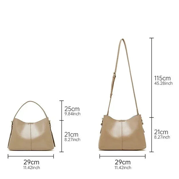 Beige leather shoulder bag with size dimensions and adjustable strap shown