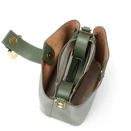 Open green leather shoulder bag with gold hardware and multiple inner compartments