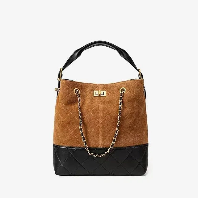 Brown suede and black leather bucket bag with gold chain strap and top handle