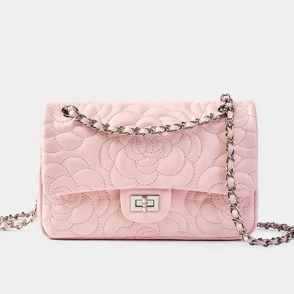 Quilted pink leather shoulder bag with silver chain strap and floral stitching detail