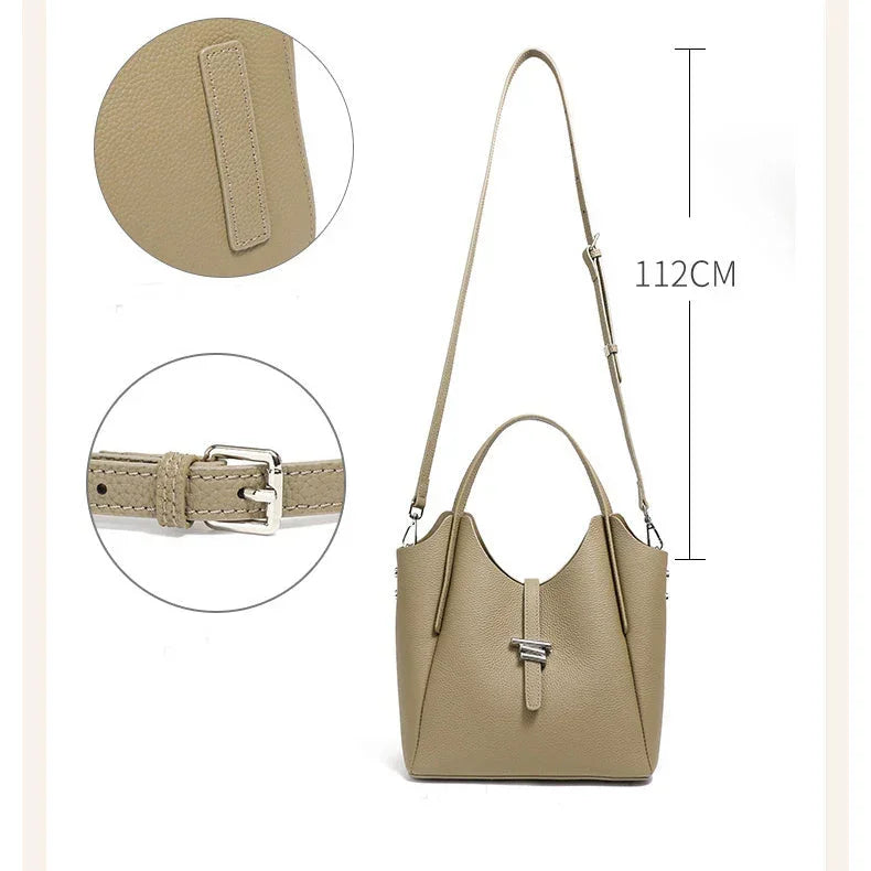 Beige leather bucket bag with adjustable shoulder strap and silver buckle, 112cm length