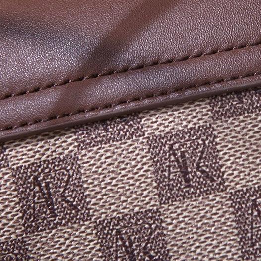 Close-up of brown leather and checkered canvas with repeating AR monogram pattern