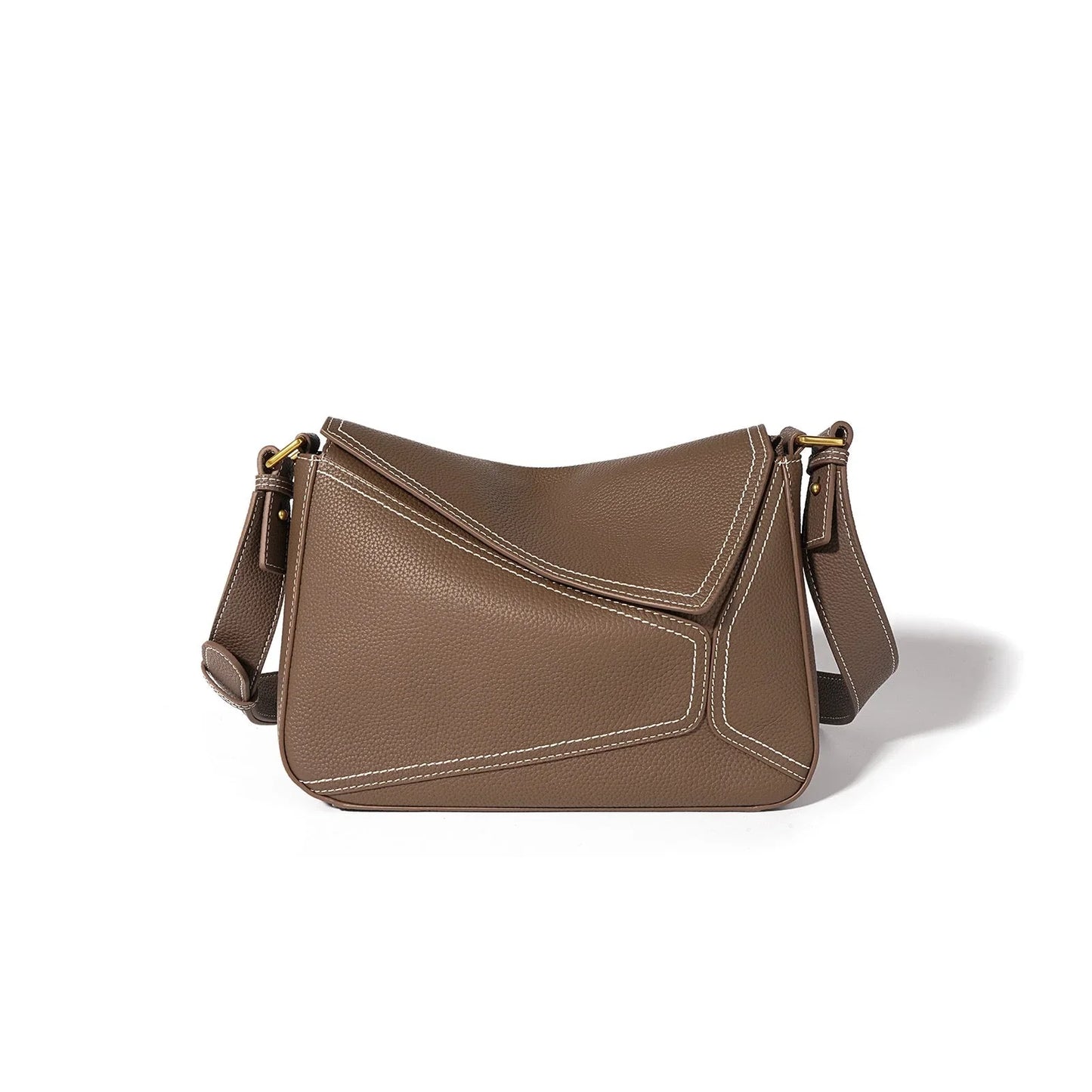 Brown leather shoulder bag with white stitching and gold hardware on white background