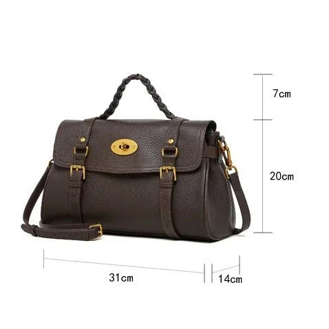 Dark brown leather handbag with top handle, shoulder strap, gold buckle, and size measurements