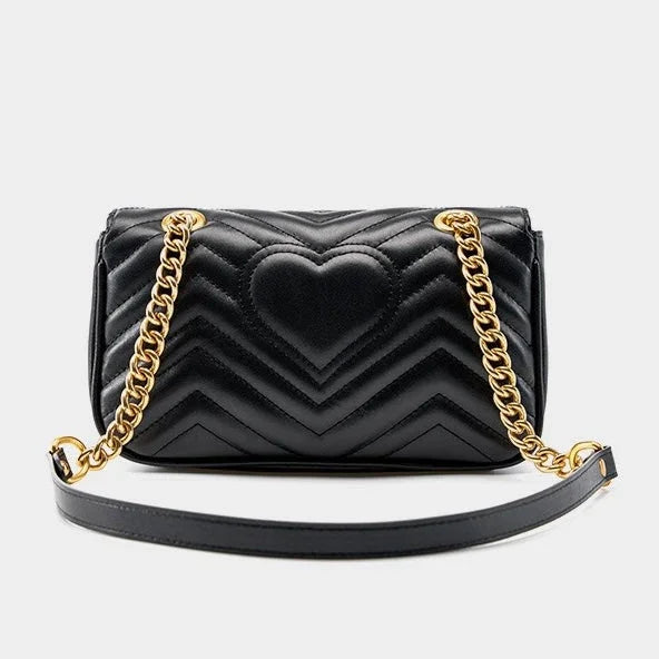 Black quilted leather handbag with heart design, gold chain strap, luxury purse