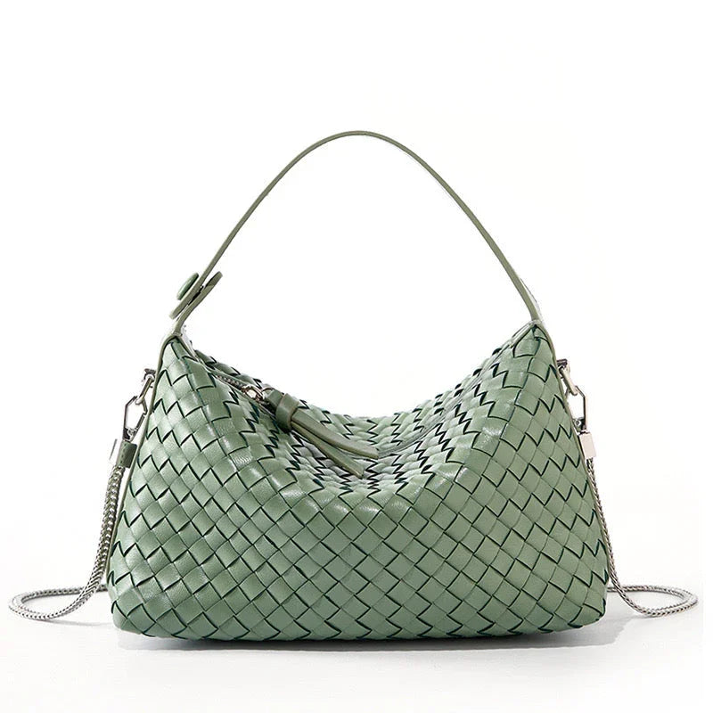 Sage green woven leather hobo bag with chain strap on white background