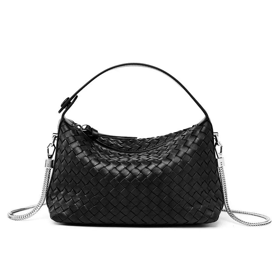 Black woven leather shoulder bag with silver chain strap on white background