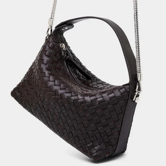 Black woven leather shoulder bag with metal chain strap on white background