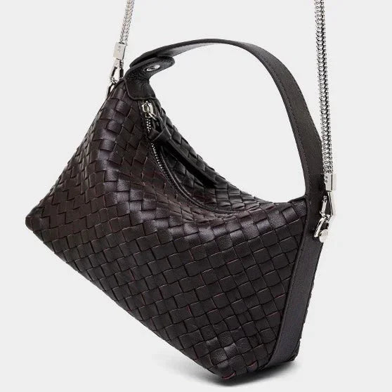 Black woven leather shoulder bag with metal chain strap on white background