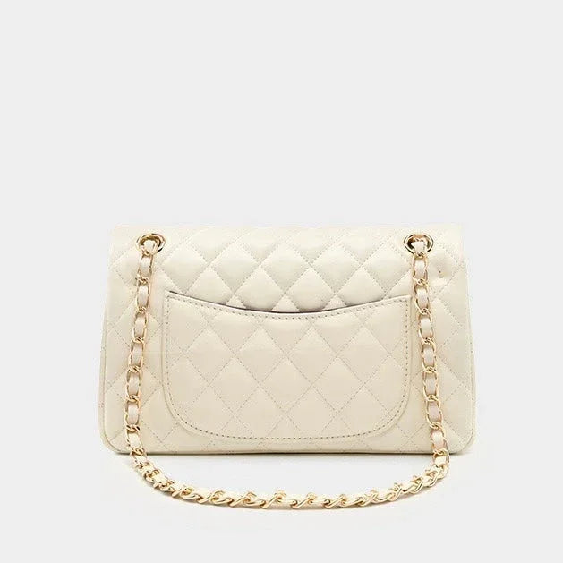 Cream quilted leather shoulder bag with gold chain strap on white background