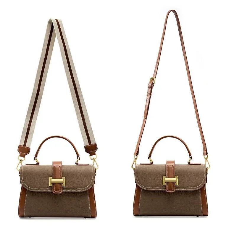 Brown leather handbag with top handle, gold buckle, and two adjustable shoulder straps