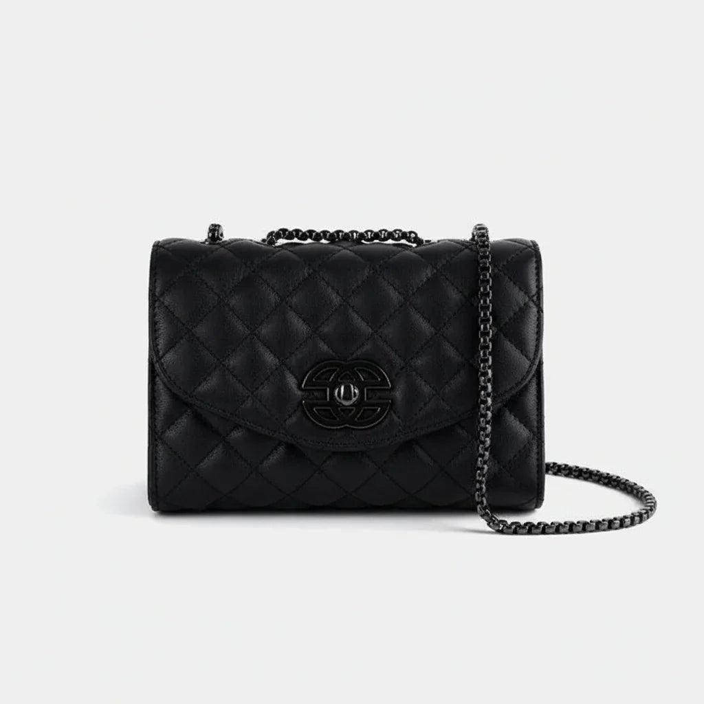 Black quilted leather shoulder bag with chain strap and metal logo on white background
