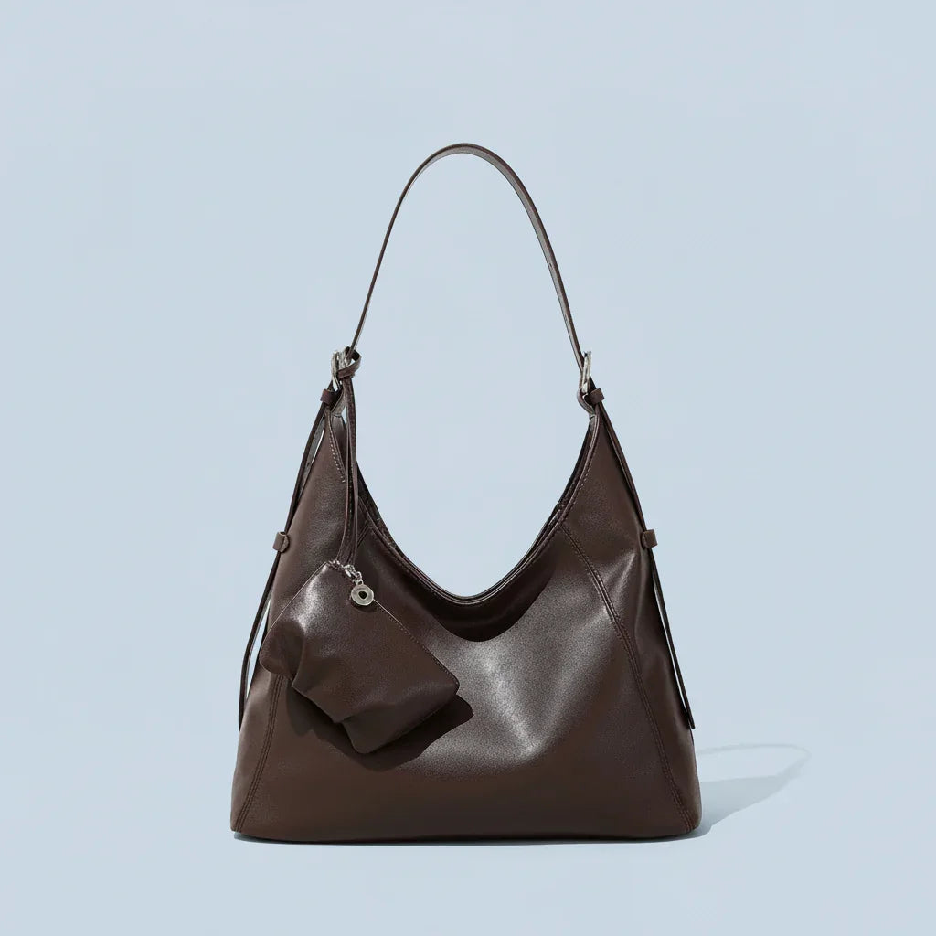 Dark brown leather hobo bag with pouch, minimalist background, stylish women's handbag