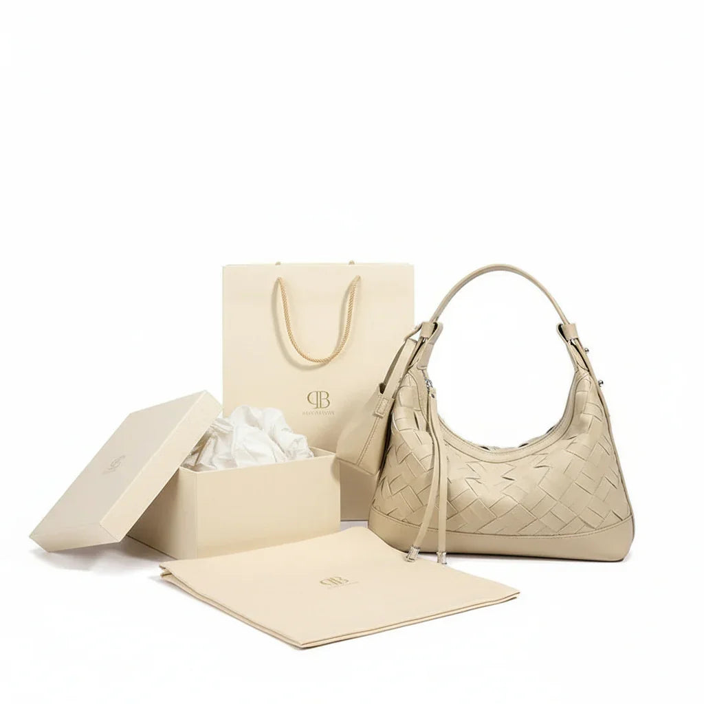Beige woven leather shoulder bag with mini pouch, hobo style, on white background