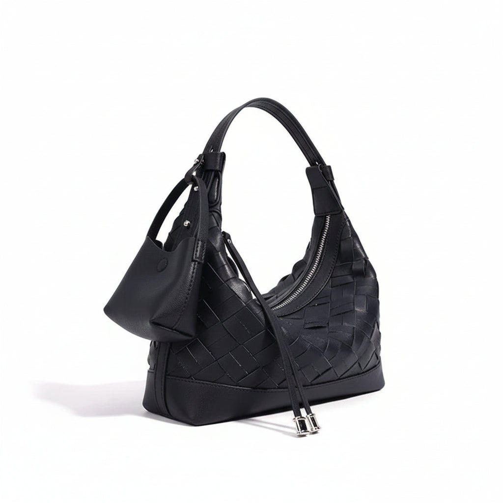 Black woven leather hobo bag with zip closure and detachable pouch on white background