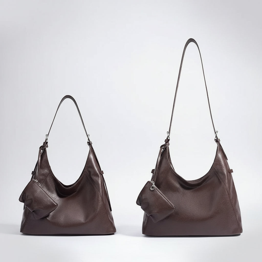 Two brown leather shoulder bags with coin purses, shown side by side on white background.