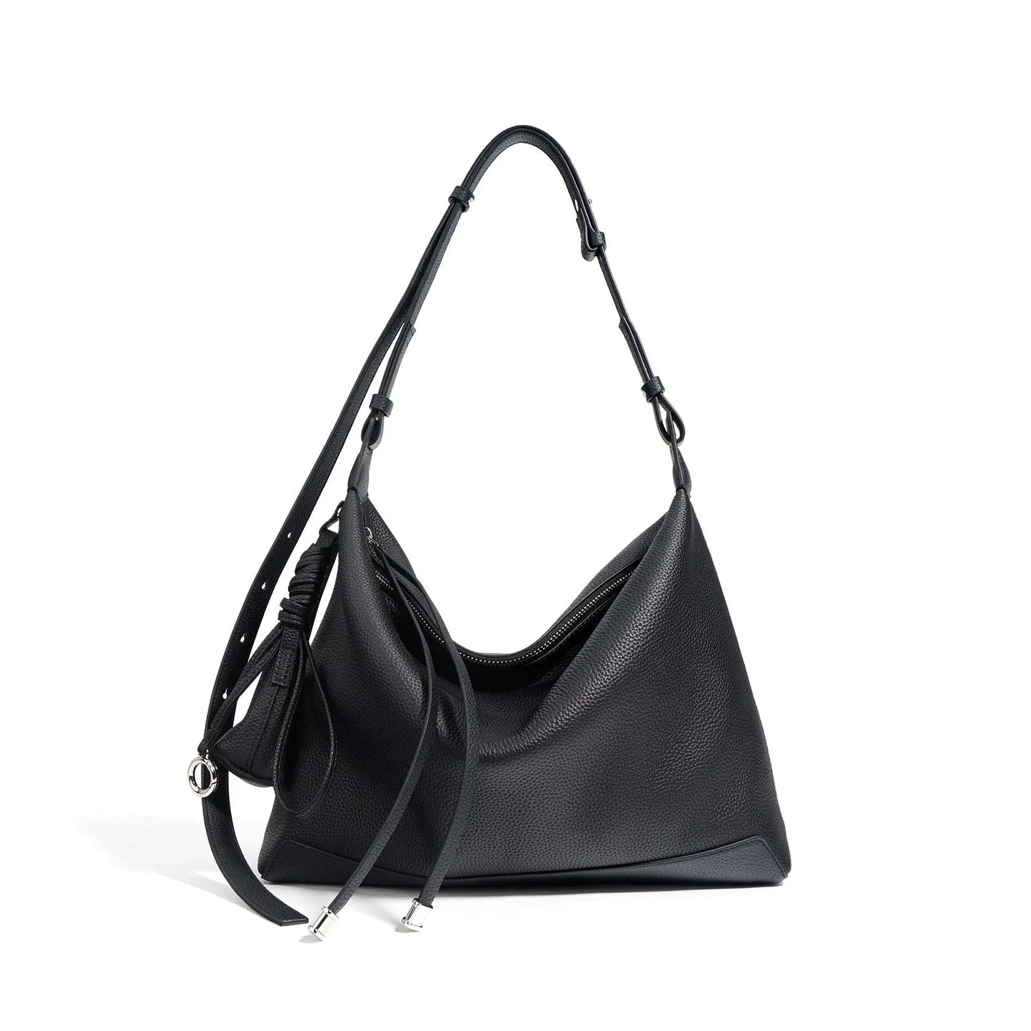 Black leather hobo bag with adjustable strap and zip closure on white background