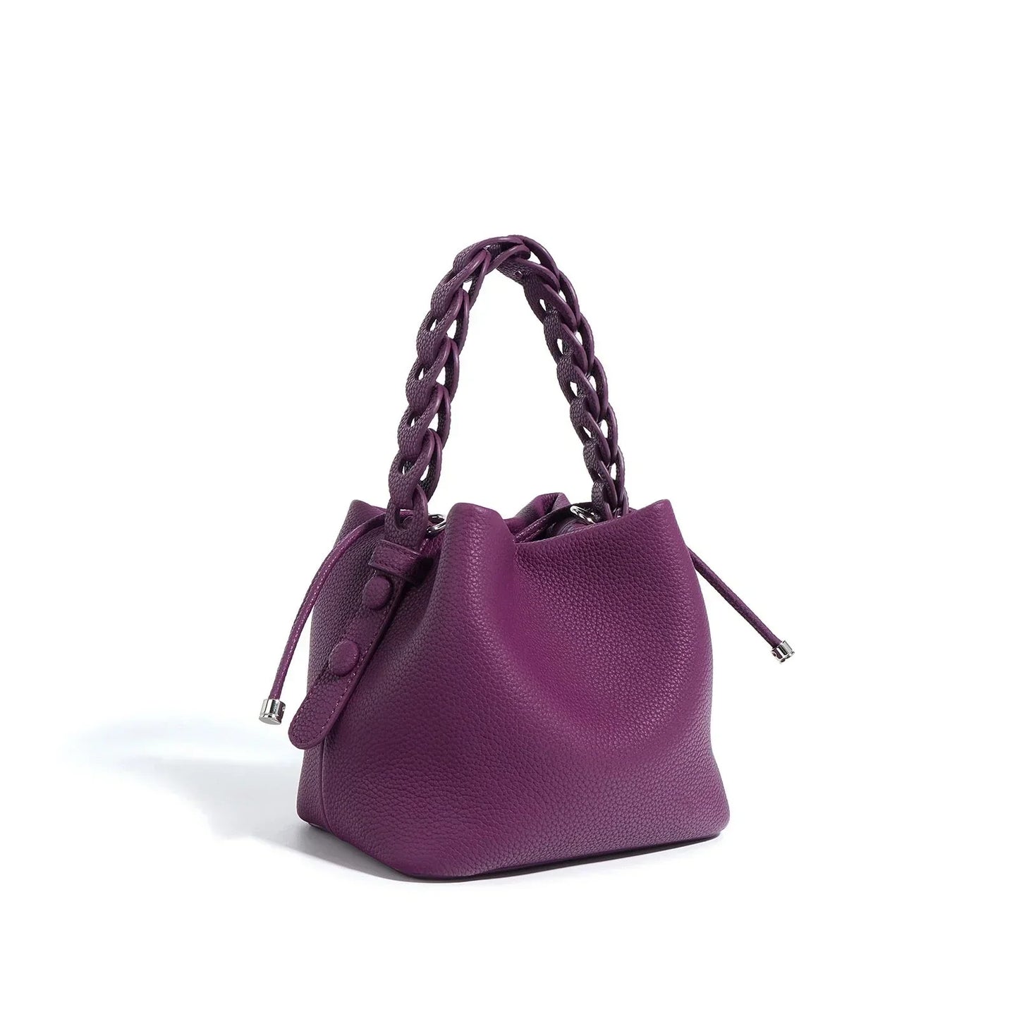 Purple leather bucket bag with braided handle and drawstring closure on white background