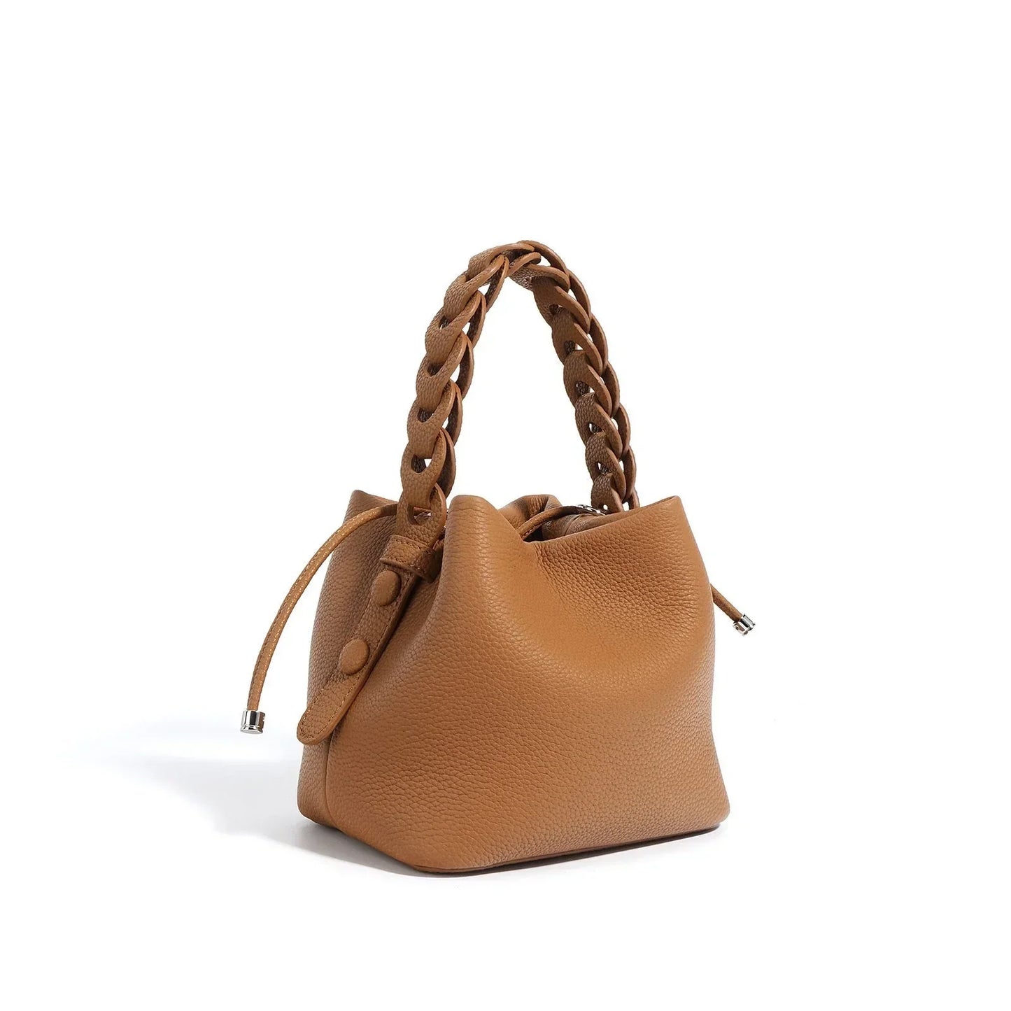 Brown leather bucket bag with braided handle and drawstring closure on white background