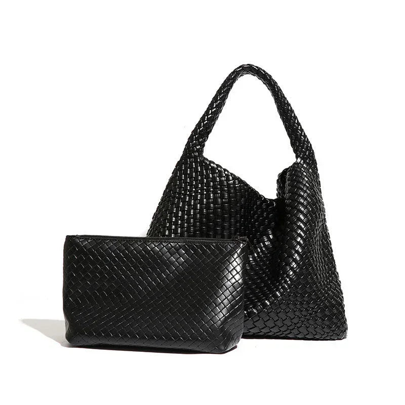 Black woven leather tote bag with matching zip pouch on white background