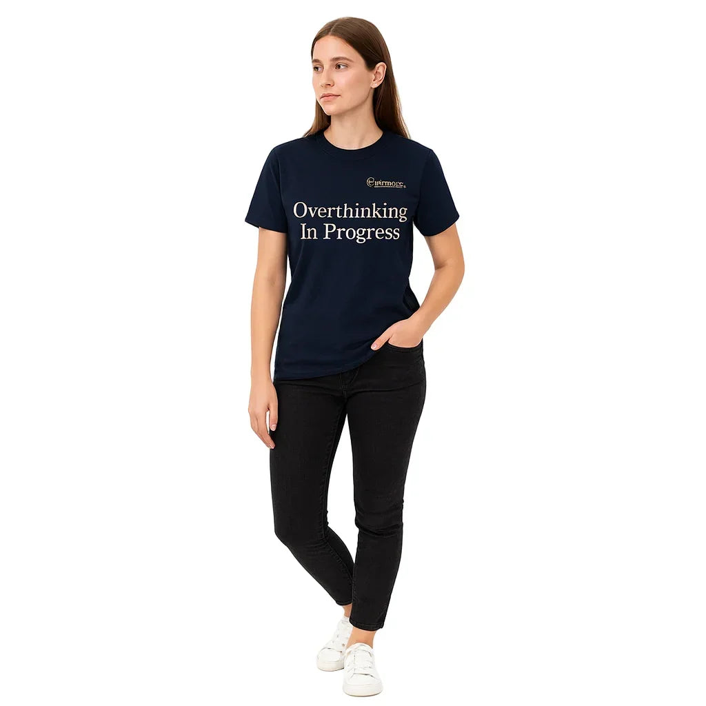 Person wearing a navy blue t-shirt with text on a white background