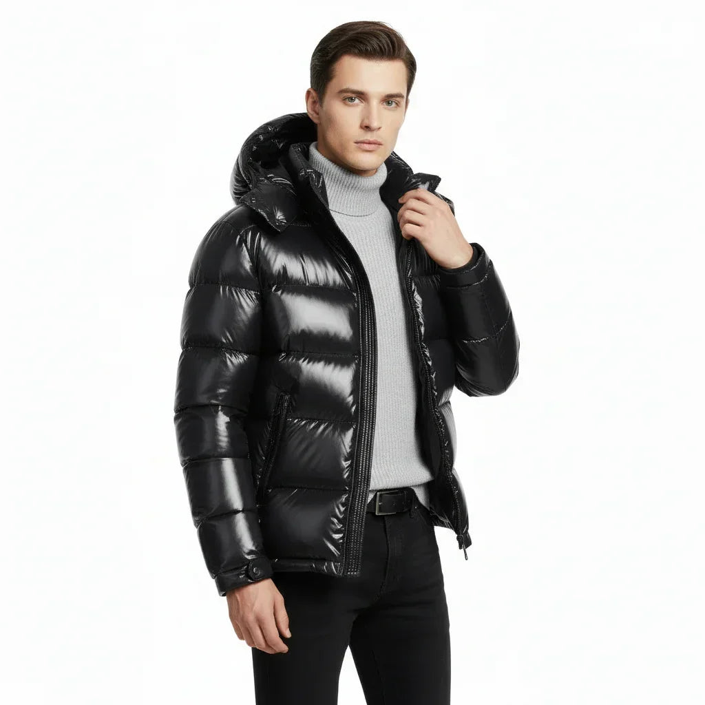 Man wearing a black puffer jacket on a white background