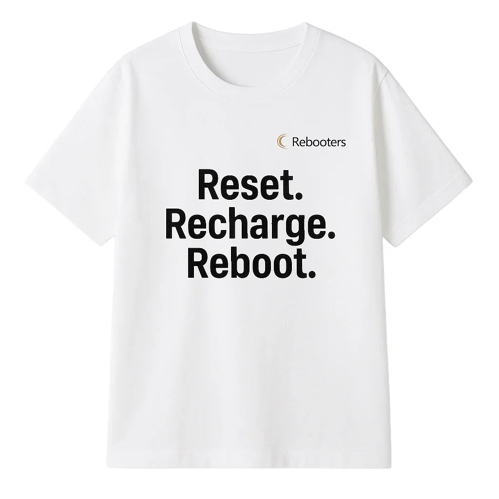 White t-shirt with 'Reset. Recharge. Reboot.' text and Rebooters logo on a white background