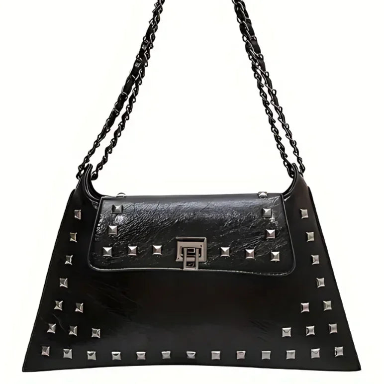 Black leather shoulder bag with silver studs, chain strap, and geometric clasp