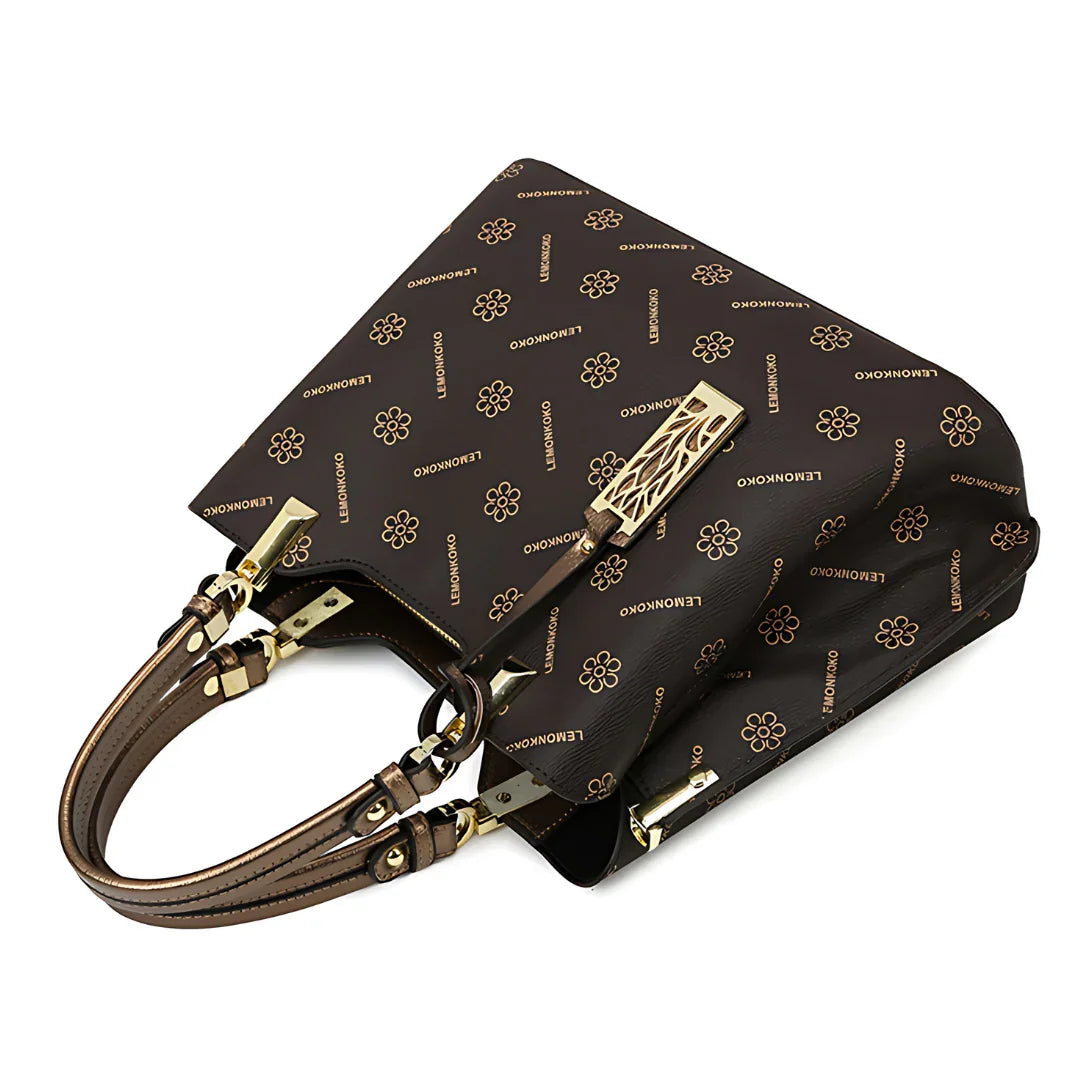 Brown LEINMONKXO designer handbag with gold floral print and dual handles