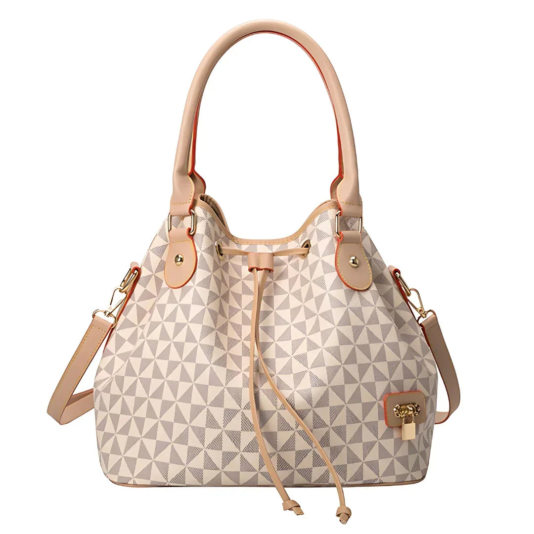 Beige geometric pattern bucket handbag with leather handles and gold accents