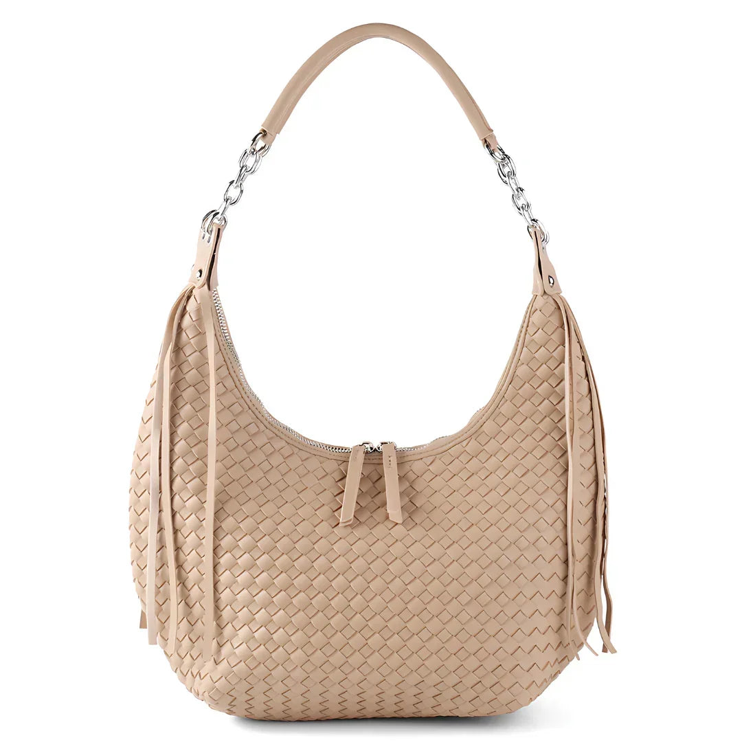Beige woven leather shoulder bag with zipper and chain strap on white background