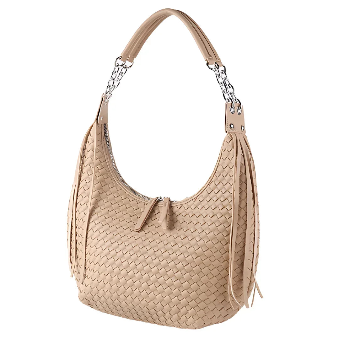 Beige woven hobo handbag with tassels and chain strap on white background