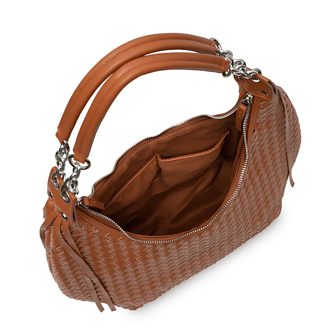 Brown woven leather handbag with double handles and zippered top, interior pockets visible.