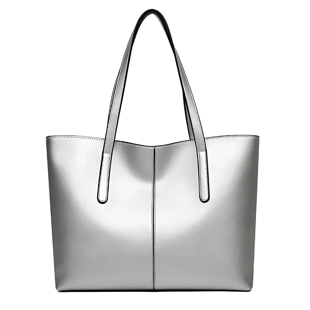 Silver tote bag with double handles and smooth faux leather finish