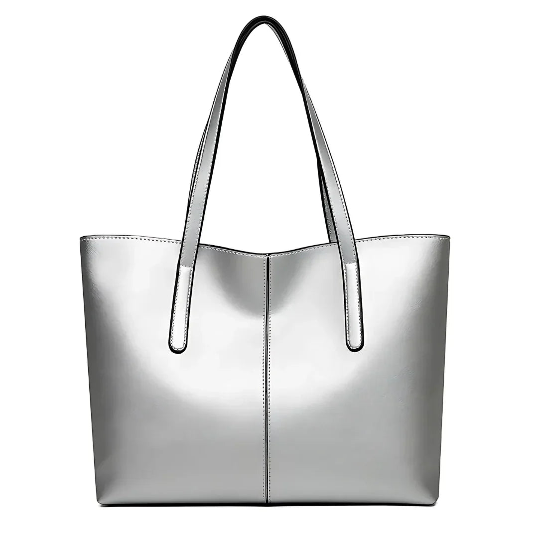 Silver tote bag with double handles and smooth faux leather finish