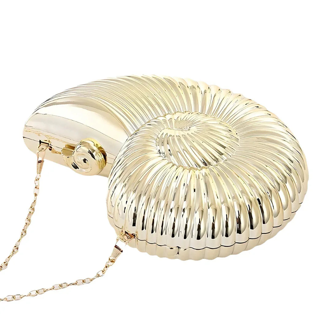Gold seashell-shaped clutch bag with metallic finish and chain strap