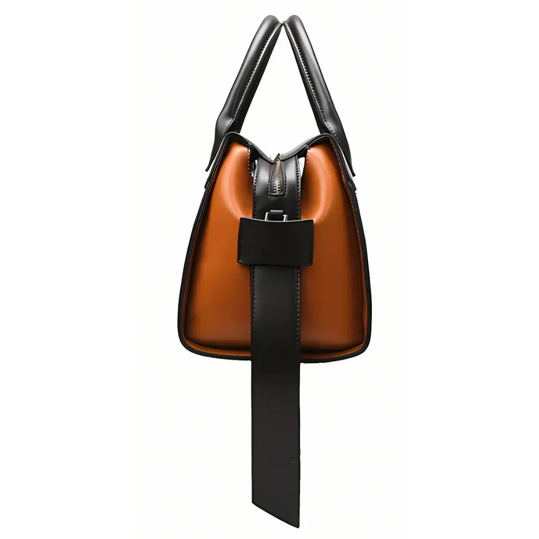 Brown and black leather handbag with top handles and modern buckle design