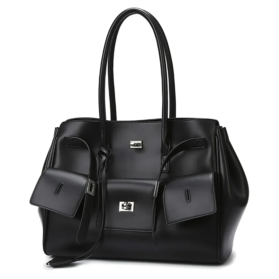 Black leather tote bag with silver hardware and double handles